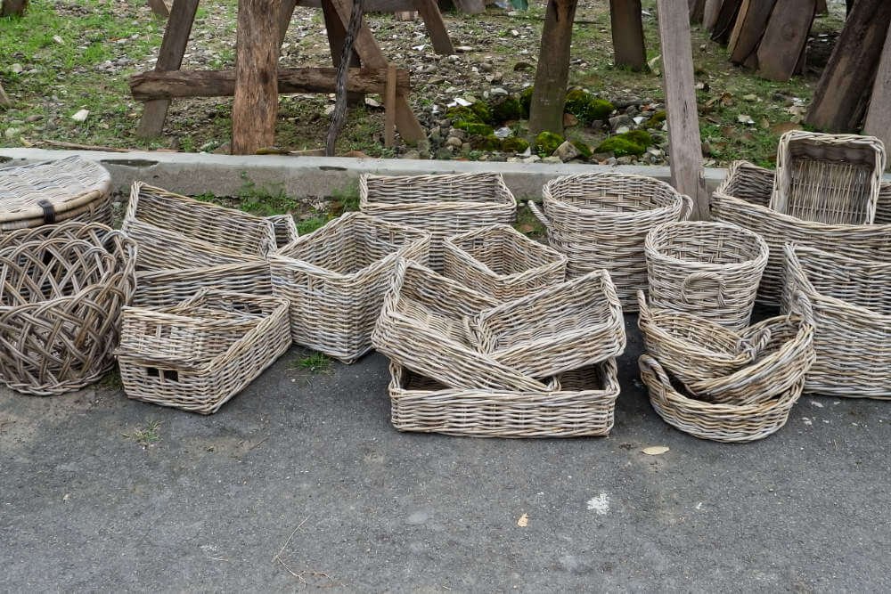 Handwoven rattan storage baskets and Indonesian wood craft accessories